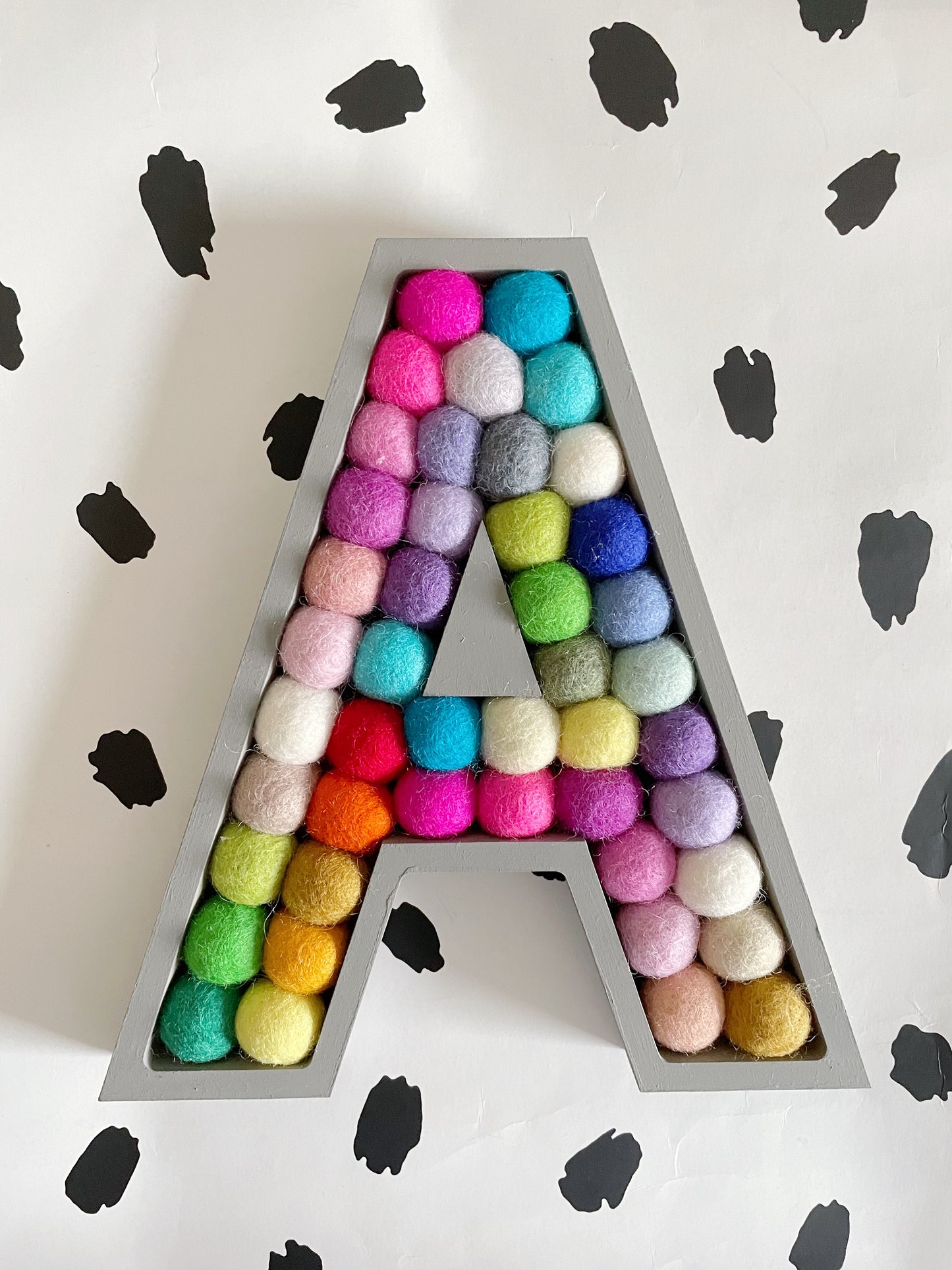 Wooden Rainbow Pom Pom Letter - 20cm Dark Grey