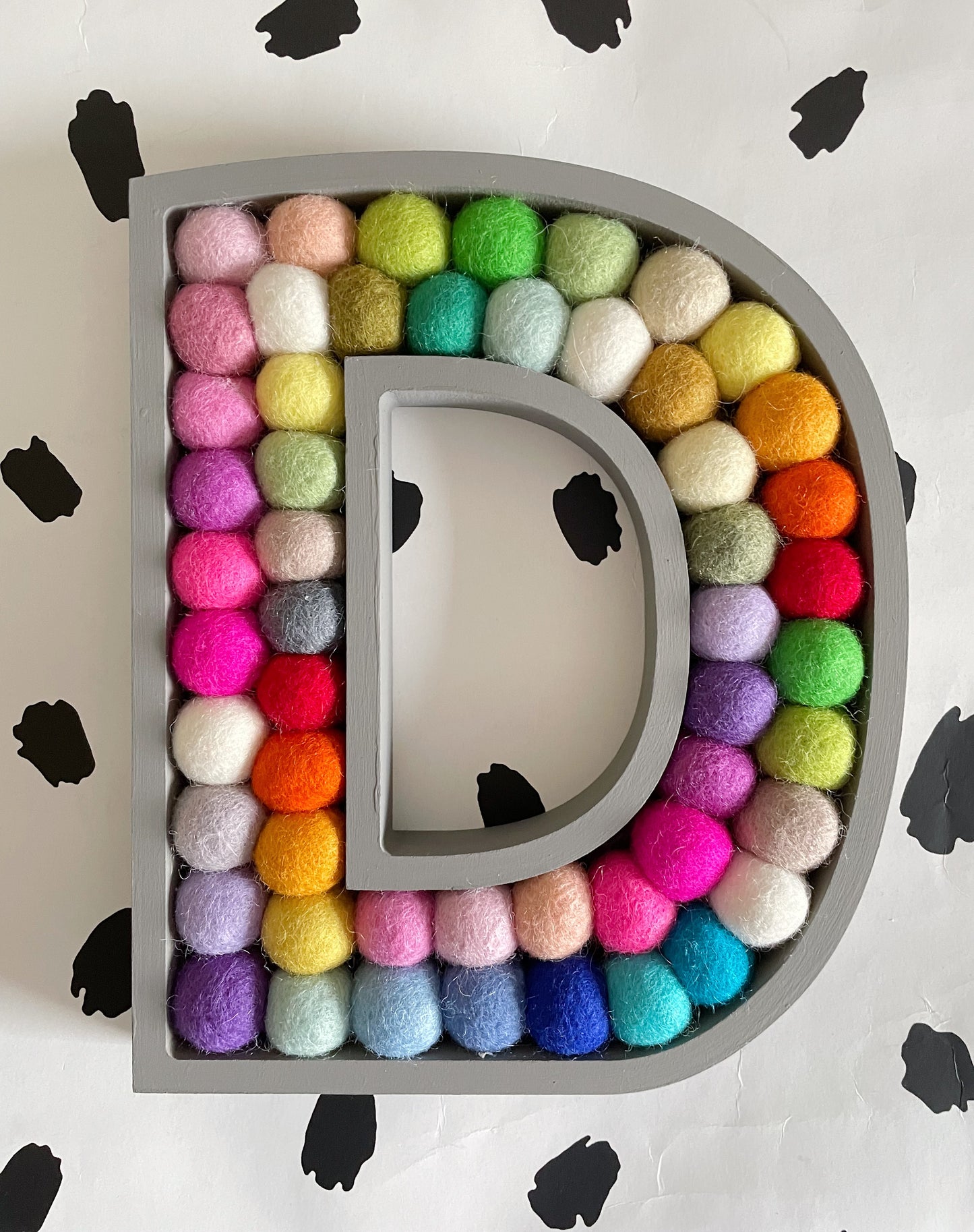 Wooden Rainbow Pom Pom Letter - 20cm Dark Grey